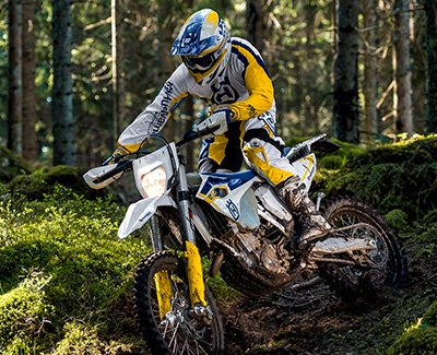 2015 Husqvarna TE250 driving in the forest