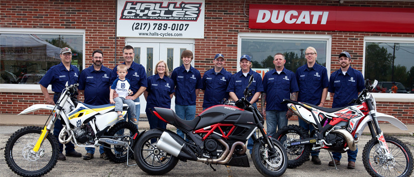 Hall's Cycles team in front of the store